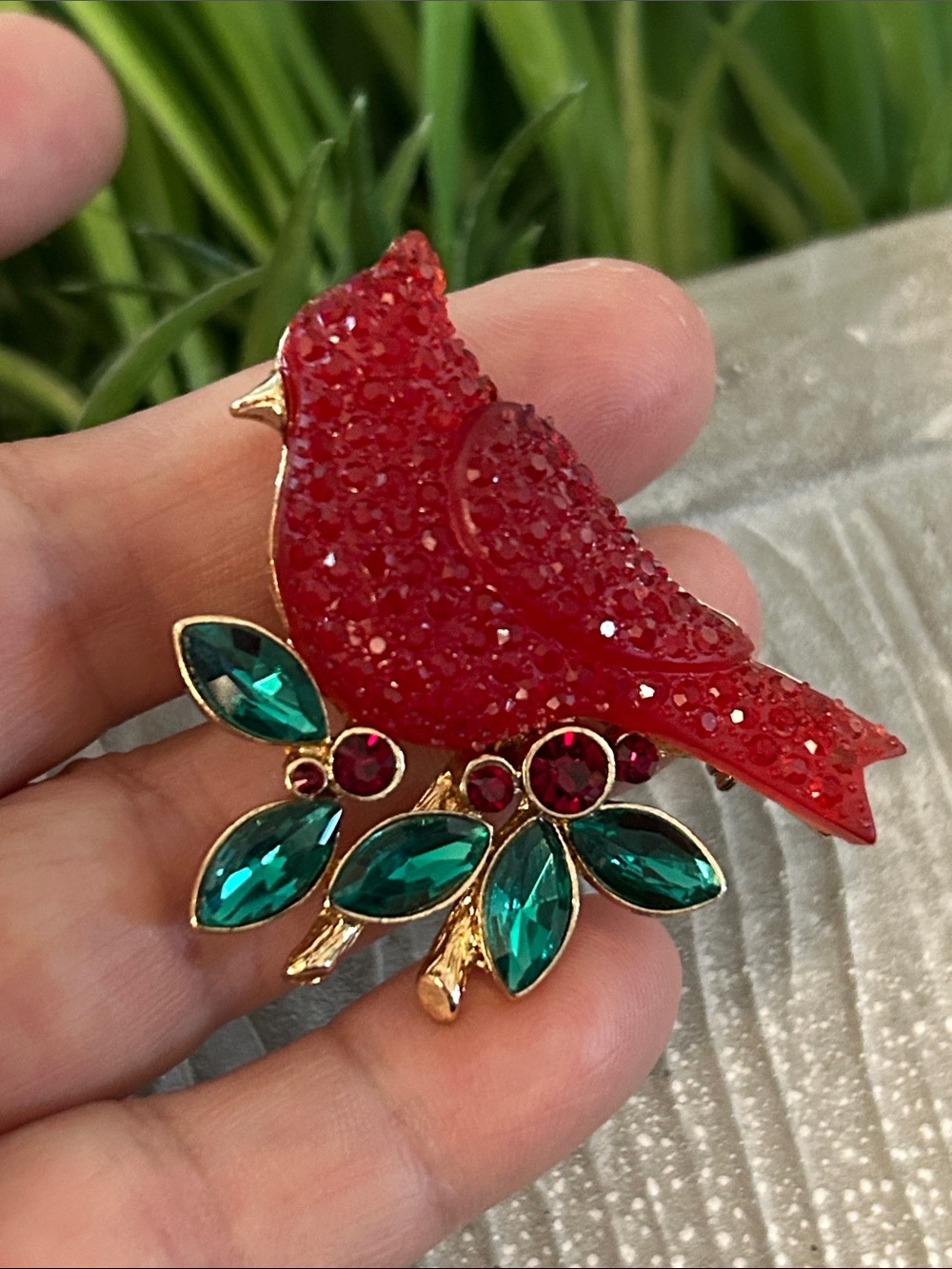 Red Cardinal Crystal Brooch with Emerald Green leaf Accents in goldtone branch